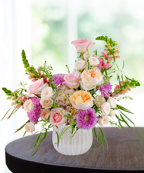 Opal Crush October birthday flower arrangement inspired by the opal birthstone with soft pastel blooms from Billy Heroman’s florist in Baton Rouge.