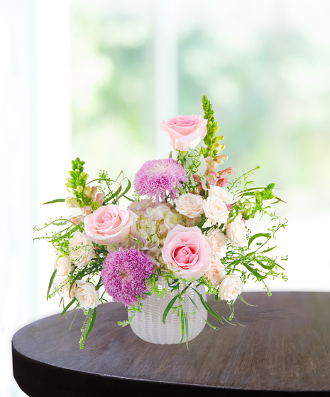 Opal Crush October birthday flower arrangement inspired by the opal birthstone with soft pastel blooms from Billy Heroman’s florist in Baton Rouge.
