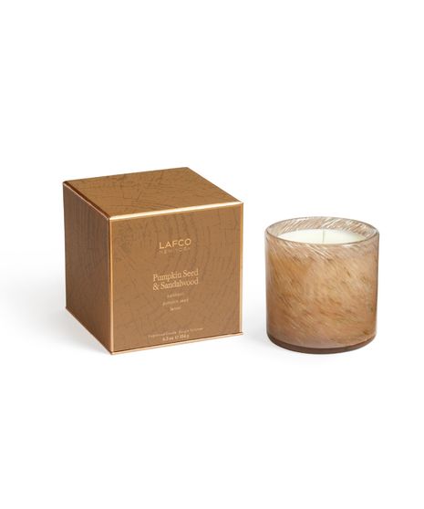 LAFCO Pumpkin Seed & Sandalwood candle with amber-toned glass and fall-inspired packaging